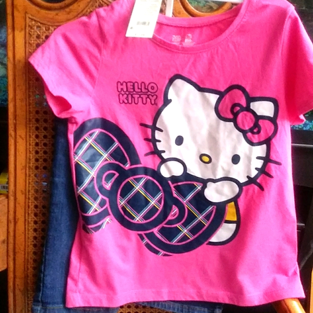 Hello Kitty shirt and a blue jean capri pants size 10 little girls.